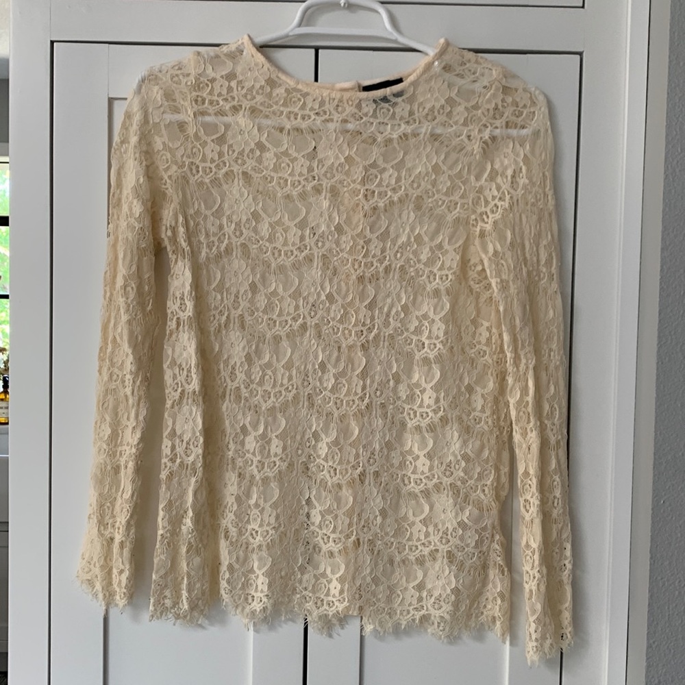 Sheer lace top with button up back